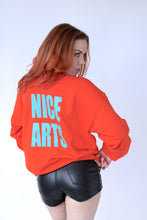 Load image into Gallery viewer, NICE ARTS unisex crewneck - Turquoise vinyl on Orange LARGE
